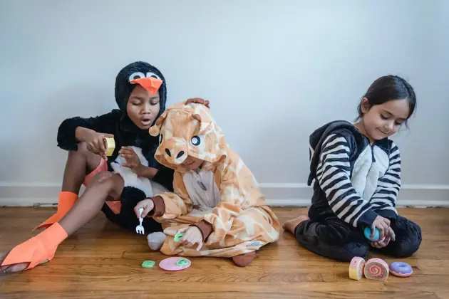 Young kids wearing animal costumes