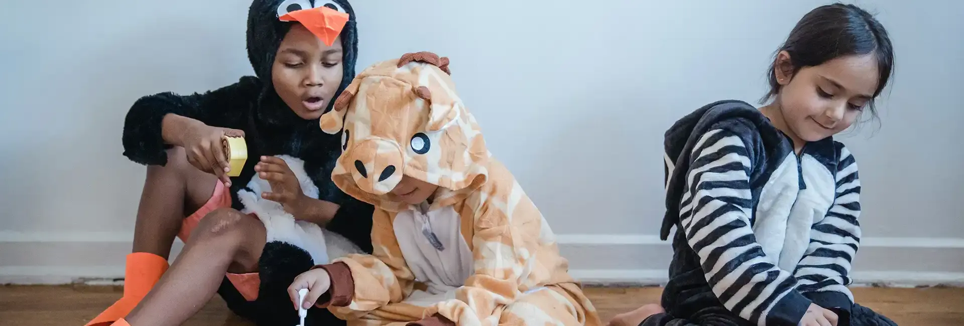 Young kids wearing animal costumes